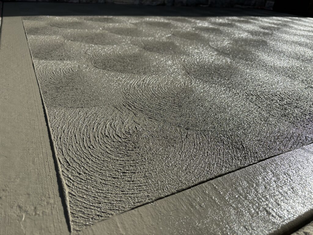 Cove Fish Scale Pattern Driveway completed by Ocon Concrete Group Sydney