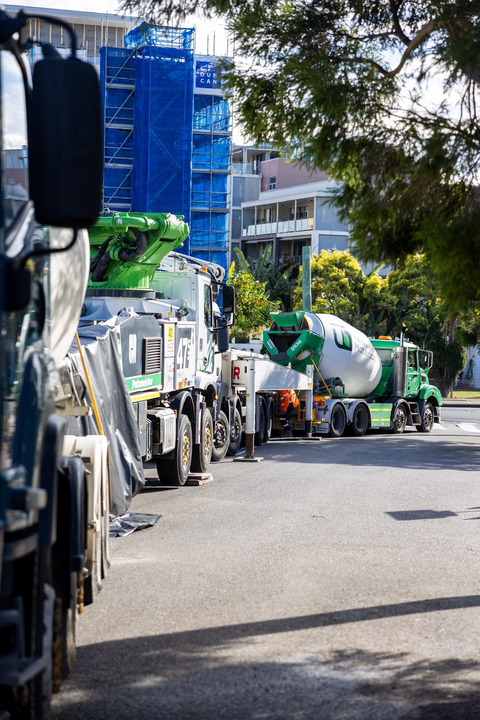 Concrete agitator trucks at the Belmont Mars Building site